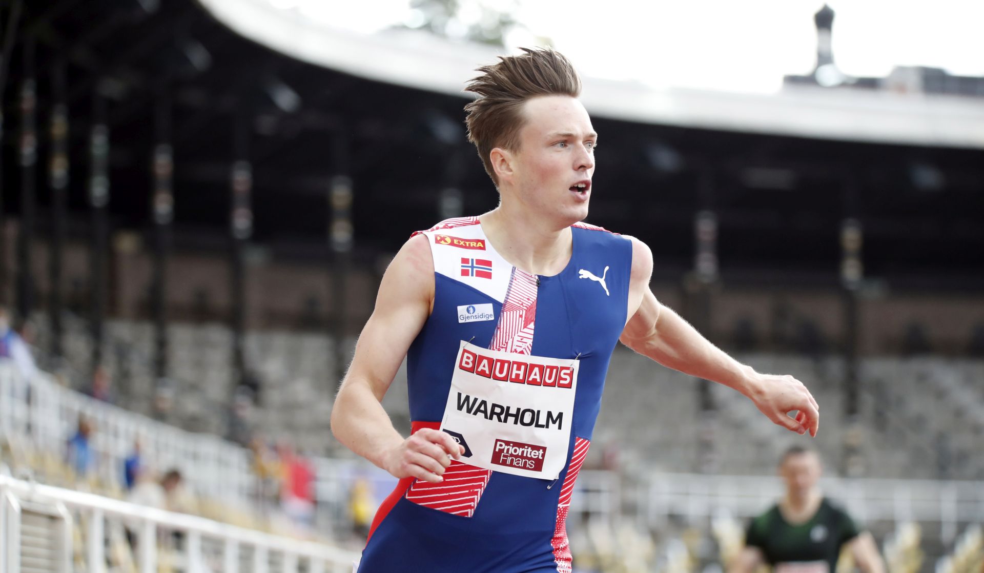 epa08619854 Norway's Karsten Warholm wins the 400 meter hurdles during the Stockholm Diamond League competition at the Stockholm Stadium, Sweden, 23 August 2020.  EPA/Christine Olsson  SWEDEN OUT