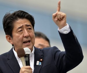 epa08630776 (FILE) - Japan's Prime Minister and leader of the ruling Liberal Democratic Party Shinzo Abe speaks to voters from the roof of a campaign van in Tokyo, Japan, 04 July 2013 (re-issued 28 August 2020). Abe is reportedly about to announce his resignation as prime minister on 28 August 2020.  EPA/FRANCK ROBICHON *** Local Caption *** 50904293