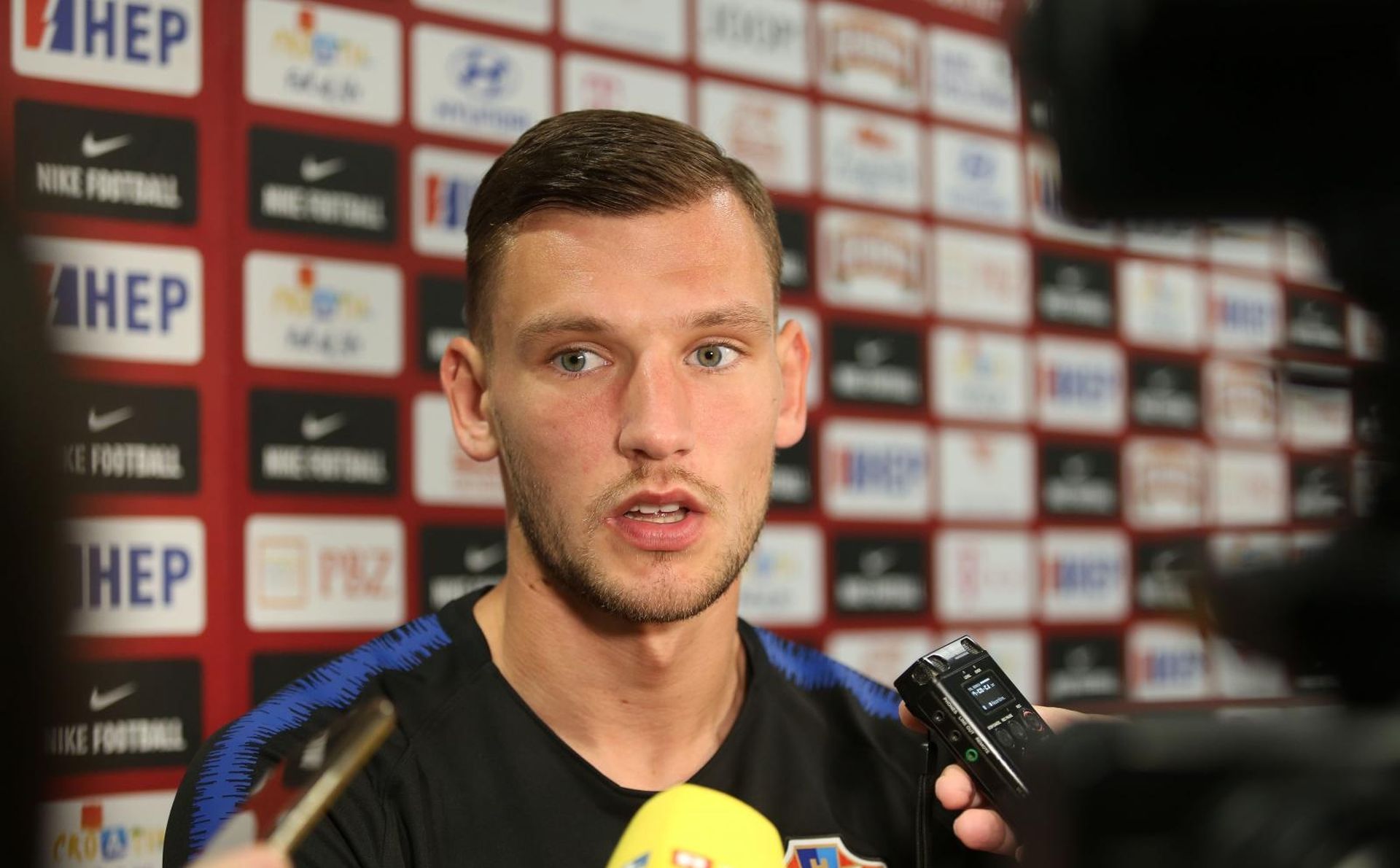 01.06.2019., Rijeka - Igraci Hrvatske  nogometne reprezentacije Borna Barisic i Mijo Caktas daju izjave u mix zoni na stadionu Rujevica. 
Photo:Goran Kovacic/PIXSELL