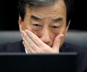 FILE PHOTO: Kurokawa, head of parliamentary committee investigating causes of Fukushima accident, looks at laptop monitor during a news conference in Tokyo FILE PHOTO: Kiyoshi Kurokawa, the head of a parliamentary committee investigating the causes of the Fukushima accident,  looks at the monitor of his laptop during a news conference in Tokyo July 5, 2012. REUTERS/Kim Kyung-Hoon/File Photo Kim Kyung Hoon