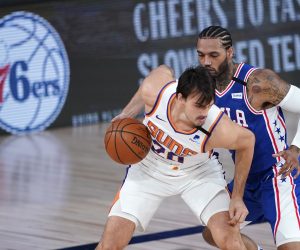 NBA: Phoenix Suns at Philadelphia 76ers Aug 11, 2020; Lake Buena Vista, Florida, USA;   Phoenix Suns forward Dario Saric (20) drives past Philadelphia 76ers forward Mike Scott (1) during the first half of an NBA basketball game Tuesday, Aug. 11, 2020, in Lake Buena Vista, Fla.  Mandatory Credit: Ashley Landis/Pool Photo-USA TODAY Sports Ashley Landis