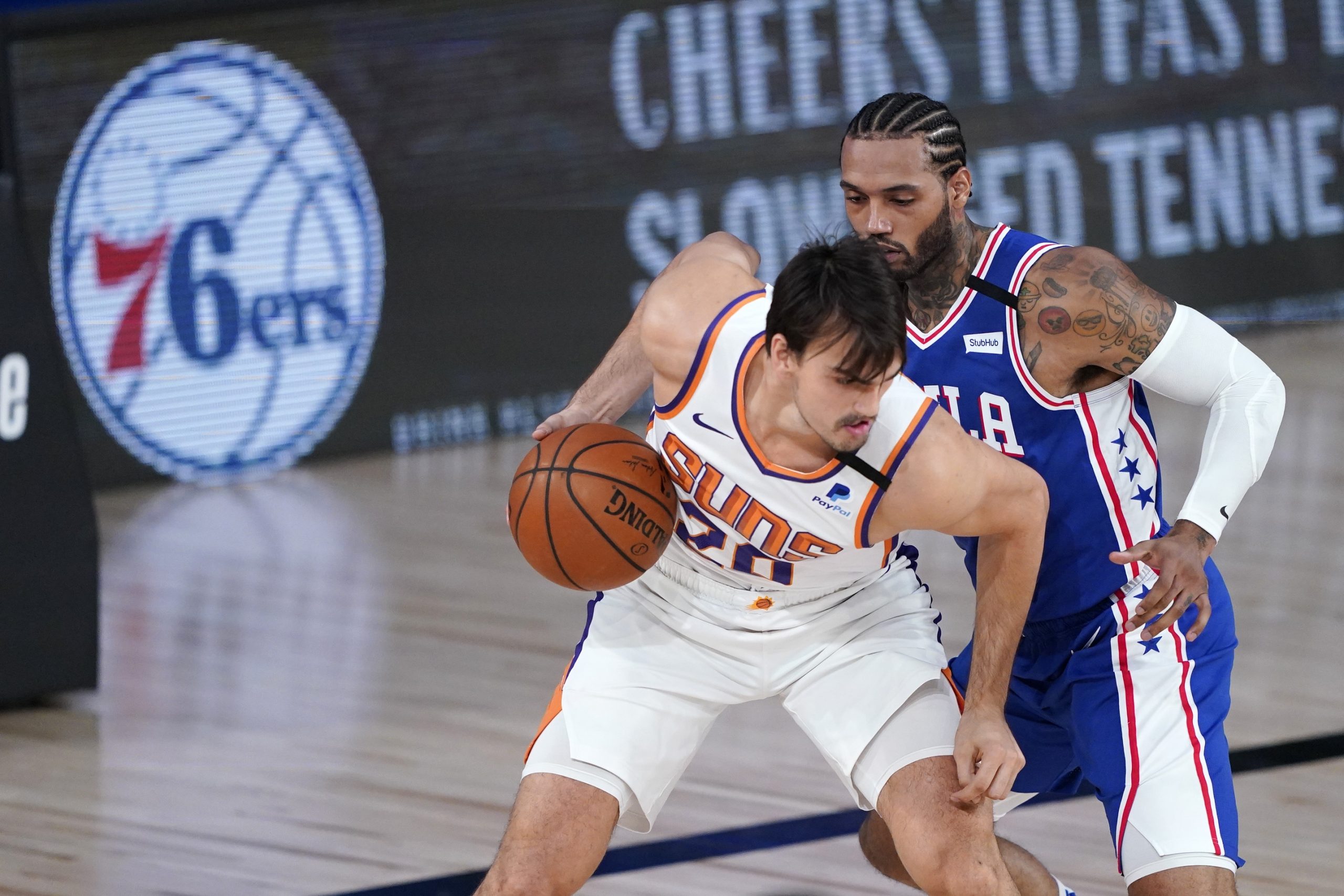 NBA: Phoenix Suns at Philadelphia 76ers Aug 11, 2020; Lake Buena Vista, Florida, USA;   Phoenix Suns forward Dario Saric (20) drives past Philadelphia 76ers forward Mike Scott (1) during the first half of an NBA basketball game Tuesday, Aug. 11, 2020, in Lake Buena Vista, Fla.  Mandatory Credit: Ashley Landis/Pool Photo-USA TODAY Sports Ashley Landis