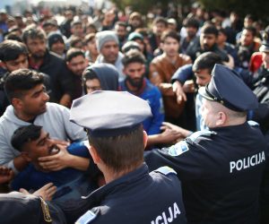 Migrants scuffle with police as they try to block a road in front of the refugee camp Miral in Velika Kladusa Migrants scuffle with police as they try to block a road in front of the refugee camp Miral in Velika Kladusa, Bosnia and Herzegovina February 15, 2020. REUTERS/Dado Ruvic DADO RUVIC