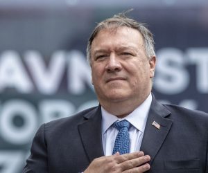 epa08597506 US Secretary of State Mike Pompeo listens to US national anthem as he commmemorates the liberation of Western Czechoslovakia by the US army at the end of WWII, at the monument 'Thank you America!' in Plzen, Czech Republic, 11 August 2020. Pompeo is on an official two-day visit to the Czech Republic.  EPA/MARTIN DIVISEK