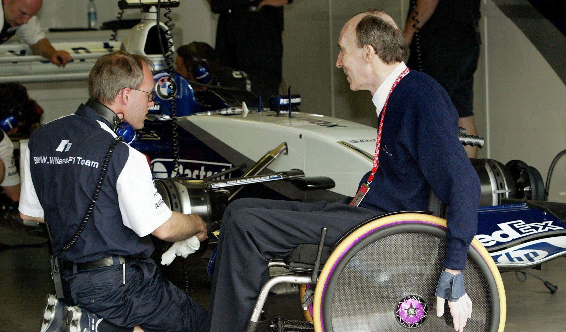 epa08615899 (FILE) - Frank Williams (R), head of BMW-Williams Formula One team, chats with one of his technicians after the free practice round at the Nuerburgring circuit, Germany, 28 June 2003 (reissued 21 August 2020). Veteran family-owned Formula One team Williams was bought by US-based investment firm Dorilton Capital, statement said on 21 August 2020.  EPA/ROLAND WEIHRAUCH    GERMANY OUT   GERMANY OUT   GERMANY OUT GERMANY OUT *** Local Caption *** 99255303