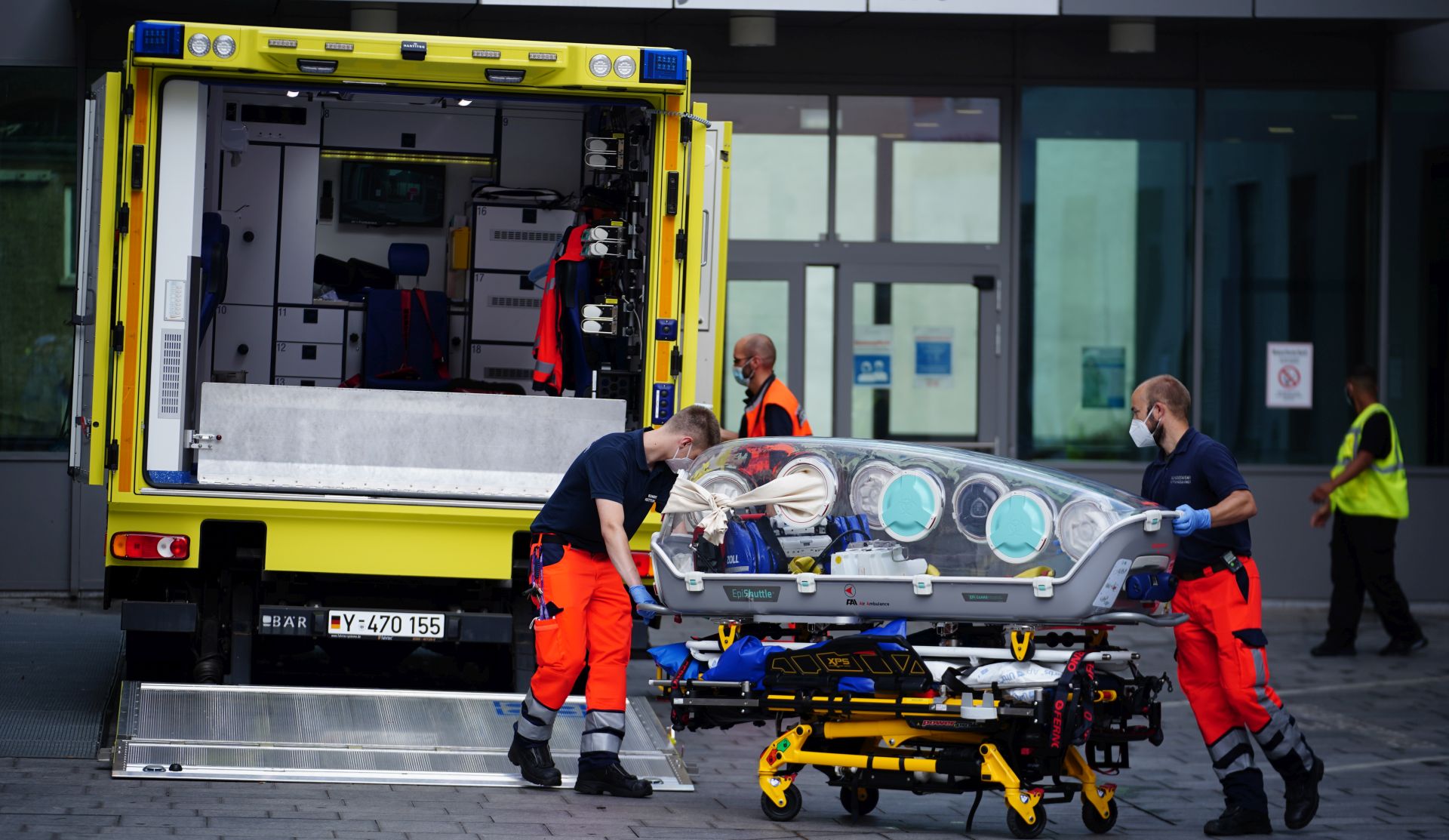 epa08617782 German Bundeswehr paramedics at the clinic after Russian opposition activist Alexei Navalny arrived at Charite clinic in Berlin, Germany, 22 August 2020. Navalny was first placed in an hospital in Omsk, Russia, after he felt bad on board of a plane on his way from Tomsk to Moscow. The flight was interrupted and after landing in Omsk Navalny was delivered to hospital with a suspicion on a toxic poisoning. The hospital management agreed on 21 August 2020 to transport Navalny to a German hospital for further treatment.  EPA/CLEMENS BILAN