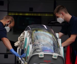 epa08617780 German Bundeswehr paramedics at the clinic after Russian opposition activist Alexei Navalny arrived at Charite clinic in Berlin, Germany, 22 August 2020. Navalny was first placed in an hospital in Omsk, Russia, after he felt bad on board of a plane on his way from Tomsk to Moscow. The flight was interrupted and after landing in Omsk Navalny was delivered to hospital with a suspicion on a toxic poisoning. The hospital management agreed on 21 August 2020 to transport Navalny to a German hospital for further treatment.  EPA/CLEMENS BILAN