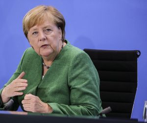 epa08629412 German Chancellor Angela Merkel speaks to the media with Bavarian Governor Markus Soeder and Hamburg Mayor Peter Tschentscher (not pictured) following a virtual meeting with governors of Germany's 16 states at the Chancellery during the coronavirus pandemic in Berlin, Germany, 27 August 2020. High on the agenda of the meeting was the limit on the number of people who may attend private gatherings in Germany in light of a recent uptick in coronavirus infections. Each state currently decides on the limit and the numbers vary widely nationwide.  EPA/Omer Messinger / POOL