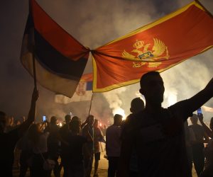 epa08637994 Montenegrian opposition supporters celebrate the election results in Podgorica, Montenegro, 31 August 2020. Montenegian opposition groups claimed victory against the Milo Djukanovic's ruling party in a tense parliamentary election that could possibly see a change in the course of the small Balkan state.  EPA/BORIS PEJOVIC