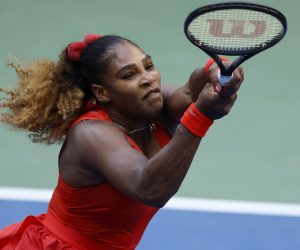 epa08640306 Serena Williams of the US hits a return to Kristie Ahn of the US during their match on the second day of the US Open Tennis Championships the USTA National Tennis Center in Flushing Meadows, New York, USA, 01 September 2020. Due to the coronavirus pandemic, the US Open is being played without fans and runs from 31 August through 13 September.  EPA/JASON SZENES