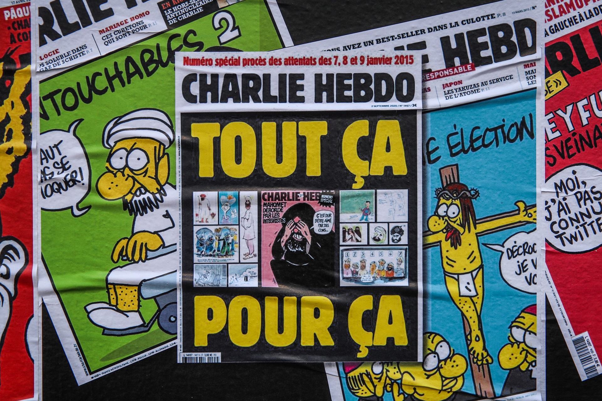epa08640715 The cover of the French satirical weekly Charlie Hebdo with the controversial cartoons of Prophet Muhammad published in 2012, got sticked on a wall next to the former office of Charlie Hebdo, in Paris, France, 02 September 2020. The Charlie Hebdo terror attack trial will be held from 02 September to 10 November 2020. The Charlie Hebdo terrorist attacks in Paris happened on 07 January 2015, with the storming of armed Islamist extremists of the satirical newspaper, starting three days of terror in the French capital.  EPA/Mohammed Badra