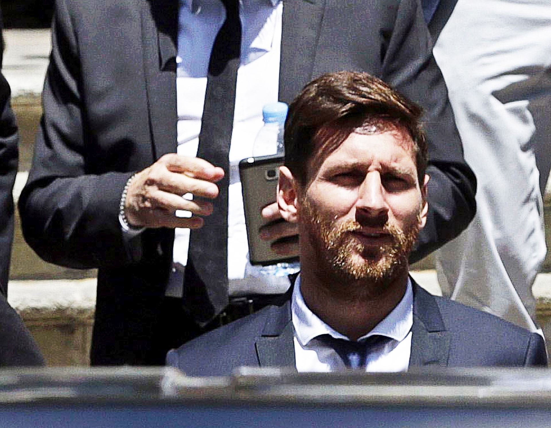 epa08640801 (FILE) - FC Barcelona's Argentinian striker Lionel Messi (front) and his father Jorge Horacio Messi (back) leave the court after their trial in Barcelona, Spain, 02 June 2016 (re-issued on 02 September 2020). Lionel Messi's father and representative Jorge Messi arrived in Barcelona to meet FC Barcelona's president Josep Maria Bartomeu to talk about the future of his son after Messi's decision to leave the Spanish La Liga soccer club.  EPA/ALBERTO ESTEVEZ *** Local Caption *** 52798089