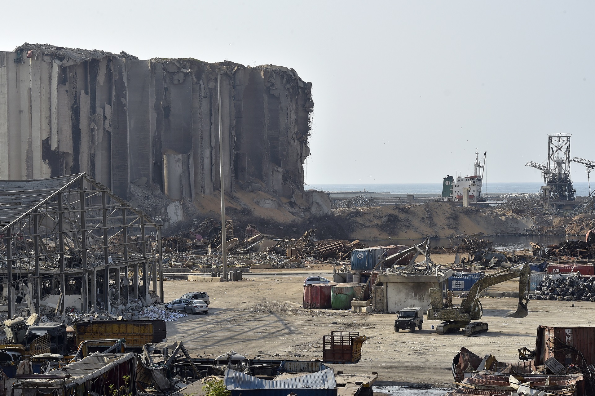 epa08641883 A view of a damaged site in Beirut port following a huge explosion rocked the city in Beirut, Lebanon, 02 September 2020. According to Lebanese Health Ministry, at least 190 people were killed, and more than six thousand injured in the Beirut blast that devastated the port area on 04 August and believed to have been caused by an estimated 2,750 tons of ammonium nitrate stored in a warehouse.  EPA/WAEL HAMZEH