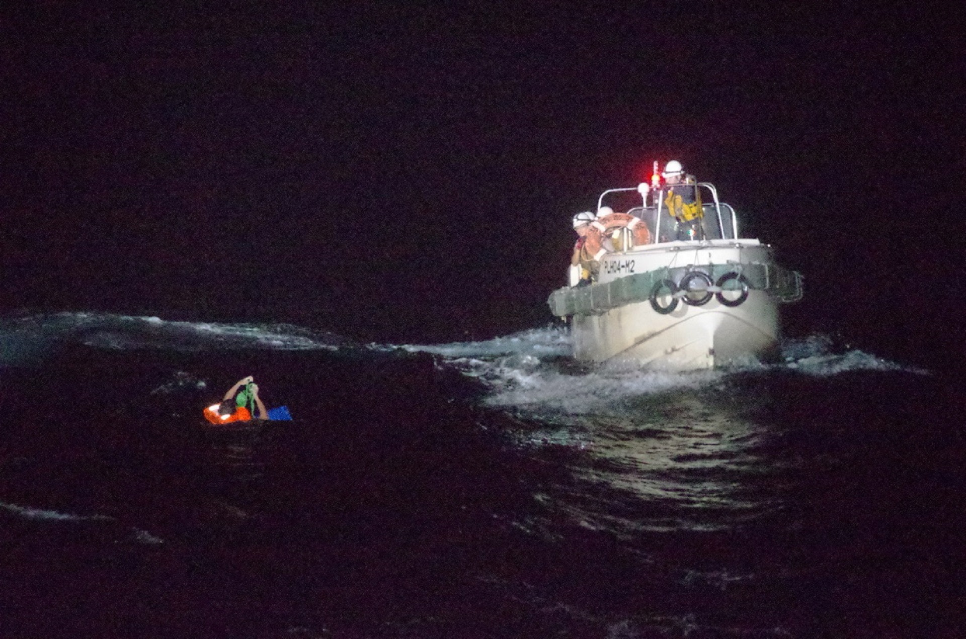 epa08643117 A handout photo made available by the Japan Coast Guard (JCG) 10th Coast Guard Headquarters shows Japan Coast Guard officers rescuing a Filipino crew member of the Gulf Livestock 1 cargo vessel, after it sank during Typhoon Maysak in the East China Sea, about 185km west of Amami-Oshima Island, Japan, 02 September 2020 (issued 03 September 2020). One survivor was rescued by JCG with over 40 crew members still missing.  EPA/JAPAN COAST GUARD 10TH REGIONAL COAST GUARD HEADQUARTERS HANDOUT JAPAN OUT HANDOUT EDITORIAL USE ONLY/NO SALES