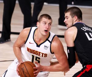 epa08645176 Denver Nuggets center Nikola Jokic (L) Serbia goes to the basket as Los Angeles Clippers center Ivica Zubac (R) of Croatia defends during the first half of the NBA basketball Western Conference semifinals playoff game one between the Denver Nuggets and Los Angeles Clippers at the ESPN Wide World of Sports Complex in Kissimmee, Florida, USA, 03 September 2020.  EPA/ERIK S. LESSER SHUTTERSTOCK OUT