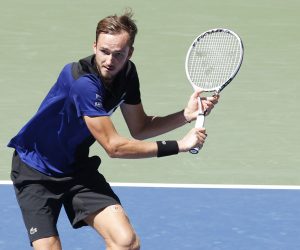 epa08649440 Daniil Medvedev of Russia hits a return to J.J. Wolf of the US during their match on the sixth day of the US Open Tennis Championships the USTA National Tennis Center in Flushing Meadows, New York, USA, 05 September 2020. Due to the coronavirus pandemic, the US Open is being played without fans and runs from 31 August through 13 September.  EPA/JASON SZENES