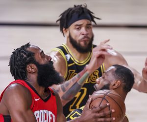epa08651780 Houston Rockets guard James Harden (L) in action against Los Angeles Lakers center JaVale McGee (C) and Los Angeles Lakers forward LeBron James (R) during the first half of the NBA basketball semifinal Western Conference playoff game two between the Houston Rockets and the Los Angeles Lakers at the ESPN Wide World of Sports Complex in Kissimmee, Florida, USA, 06 September 2020.  EPA/ERIK S. LESSER  SHUTTERSTOCK OUT