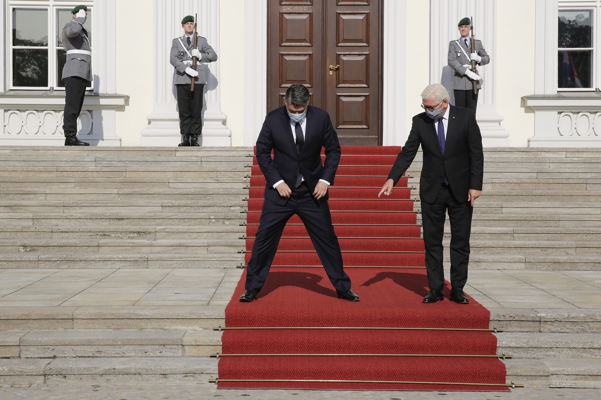 epa08660726 German President Frank-Walter Steinmeier (R) welcomes Croatian President Zoran Milanovic (L) at the Bellevue Palace in Berlin, Germany, 11 September 2020. Croatian President Zoran Milanovic is on a one-day state visit to Germany.  EPA/MARKUS SCHREIBER / POOL