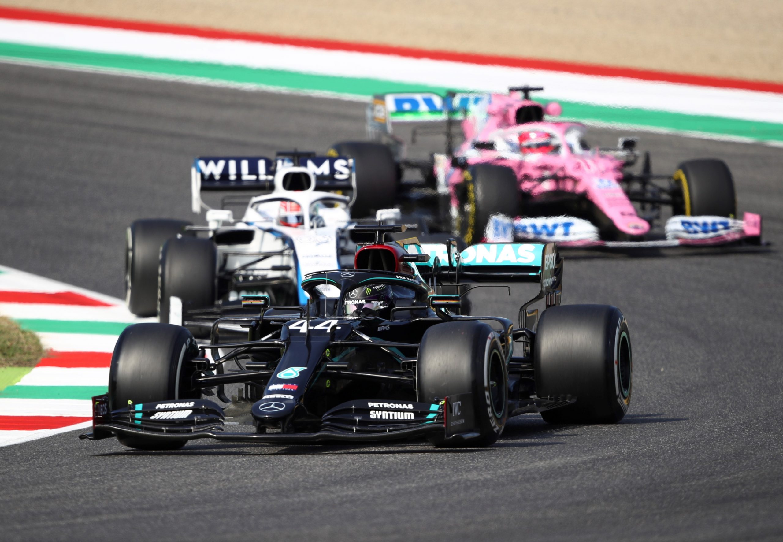 epa08661558 British Formula One driver Lewis Hamilton (front) of Mercedes-AMG Petronas in action during the second practice session of the Formula One Grand Prix of Tuscany at the race track in Mugello, Italy, 11 September 2020. The 2020 Formula One Grand Prix of Tuscany will take place on 13 September 2020.  EPA/Bryn Lennon / Pool