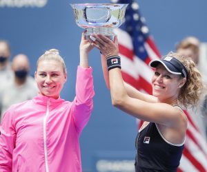 epa08662305 Teammates Vera Zvonareva (L) of Russia and Laura Siegemund of Germany hold their trophy after defeating Nicole Melichar of the US and Yifan Xu of China in the women's doubles final match on the twelfth day of the US Open Tennis Championships the USTA National Tennis Center in Flushing Meadows, New York, USA, 11 September 2020. Due to the coronavirus pandemic, the US Open is being played without fans and runs from 31 August through 13 September.  EPA/JUSTIN LANE