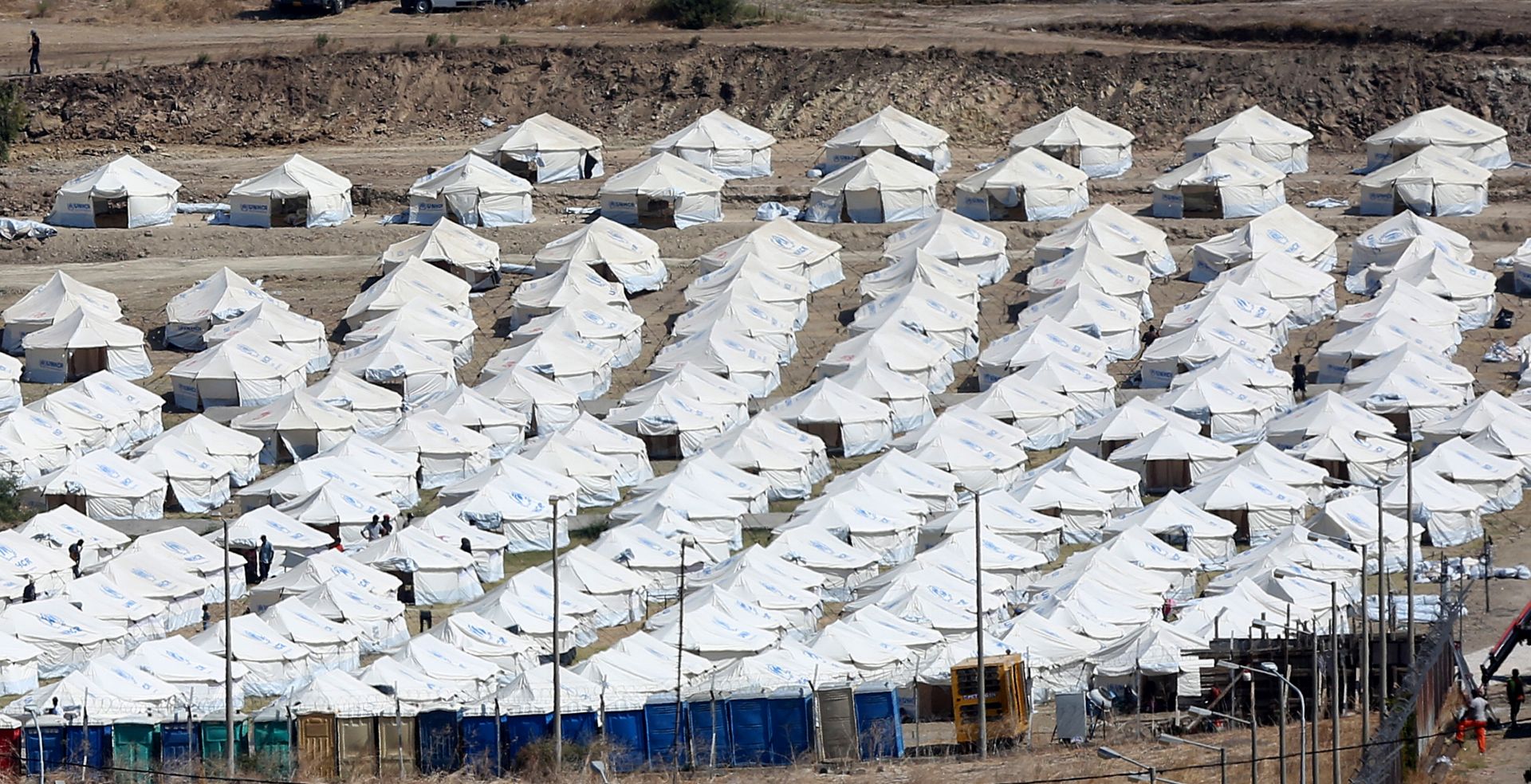 epa08665926 A general view of the new refugee camp at Kara Tepe on Lesbos island, Greece, 13 September 2020. Some two hundred refugees and migrants, mostly families have already entered the camp after they were examined for Covid-19.  EPA/ORESTIS PANAGIOTOU