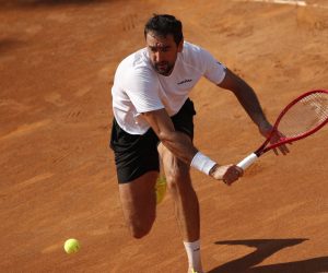 epa08668461 Marin Cilic of Croatia in action during his Men's Singles first round match against Alexander Bublik of Kazakhastan at the Italian Open tennis tournament in Rome, Italy, 14 September 2020.  EPA/Clive Brunskill / POOL