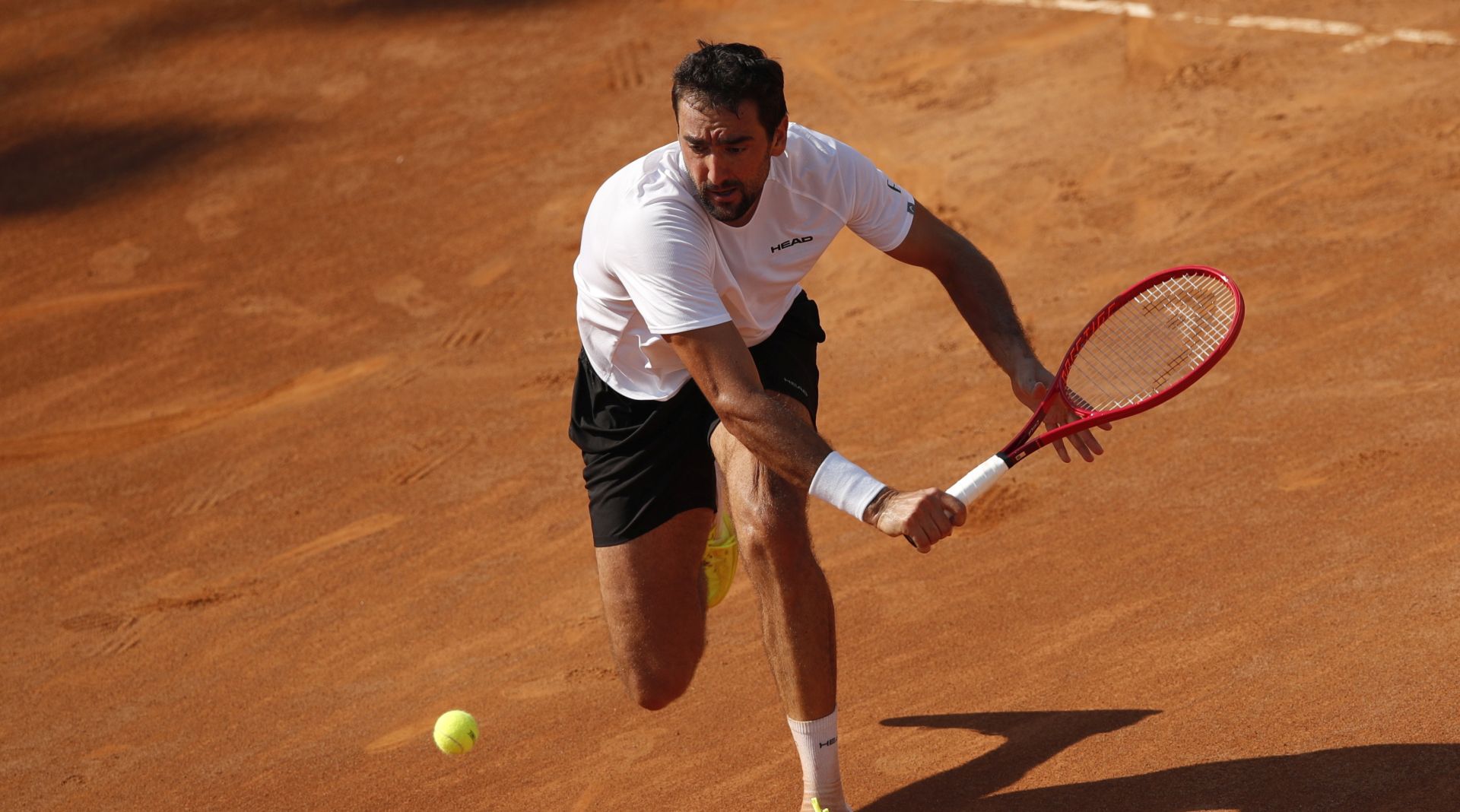 epa08668461 Marin Cilic of Croatia in action during his Men's Singles first round match against Alexander Bublik of Kazakhastan at the Italian Open tennis tournament in Rome, Italy, 14 September 2020.  EPA/Clive Brunskill / POOL