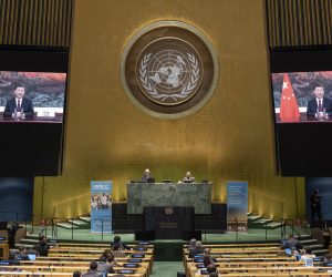 epa08687245 A handout photo made available by UN photo shows Xi Jinping (on screens), President of the People's Republic of China, speaking during the 75th General Assembly of the United Nations, in New York, New York, USA, 21 September 2020. Due to the COVID-19 coronavirus pandemic, the 75th General Assembly of the United Nations meetings are held mostly virutal. Seated at dais are Volkan Bozkir (at left), President of the seventy-fifth session of the United Nations General Assembly, and Secretary-General Antonio Guterres.  EPA/Eskinder Debebe / UN Photo / HANDOUT  HANDOUT EDITORIAL USE ONLY/NO SALES