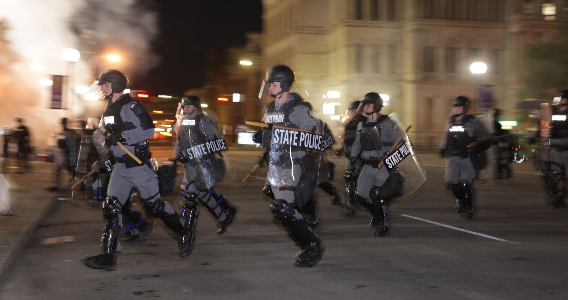 epaselect epa08692565 Kentucky State Police clear protestors from Jefferson Square Park as people take to the streets to protest the results of a grand jury indictment of three counts of wanton endangerment of former Louisville police officer Brett Hankison; in Louisville, Kentucky, USA, 23 September 2020. Hankison was involved in the death of Breonna Taylor during a no knock police raid in Louisville on 13 March 2020. Two other officers involved were not charged. According to media reports, two officers were shot and injured near a protest site in Louisville. Their condition is unknown.  EPA/Mark Lyons