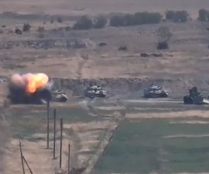 epa08700714 A frame grab from handout video provided by the Armenian Ministry of Defence allegedly shows an Azerbaijani tank being destroyed by the Armenian army at the frontline of the self-proclaimed Republic of Nagorno-Karabakh, between Armenia and Azerbaijan, issued 27 September 2020. According to media reports, Armenia has imposed martial law after clashes have erupted in the territorial conflict between Armenia and Azerbaijan in Nagorno-Karabakh Republic, with both sides reporting civilian deaths after alleged shelling, artillery and air attacks along the front.  EPA/MINISTRY OF DEFENCE OF ARMENIA HANDOUT  HANDOUT EDITORIAL USE ONLY/NO SALES