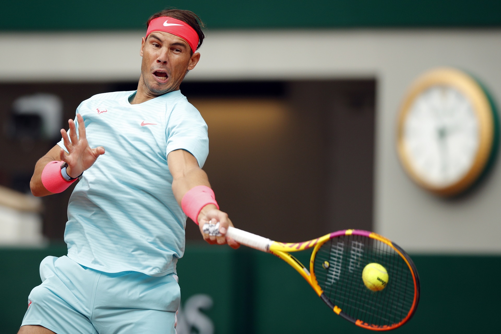 epa08708326 Rafael Nadal of Spain in action against Mackenzie McDonald of the USA during their men’s second round match during the French Open tennis tournament at Roland ​Garros in Paris, France, 30 September 2020.  EPA/YOAN VALAT