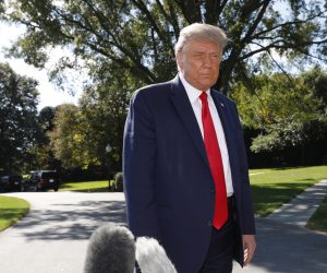 epa08709893 US President Donald J. Trump talks to the media on the South Lawn of the White House in Washington, DC, USA, 30 September 2020, before his departure for campaign travel to Duluth, Minnesota.  EPA/Yuri Gripas / POOL