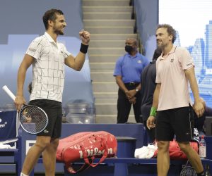 epa08660030 Mate Pavic of Croatia (L) and Bruno Soares of Brazil (R) celebrate after defeating Wesley Koolhof of the Netherlands and Nikola Mektic of Croatia in the men's doubles final match on the eleventh day of the US Open Tennis Championships the USTA National Tennis Center in Flushing Meadows, New York, USA, 10 September 2020. Due to the coronavirus pandemic, the US Open is being played without fans and runs from 31 August through 13 September.  EPA/JASON SZENES