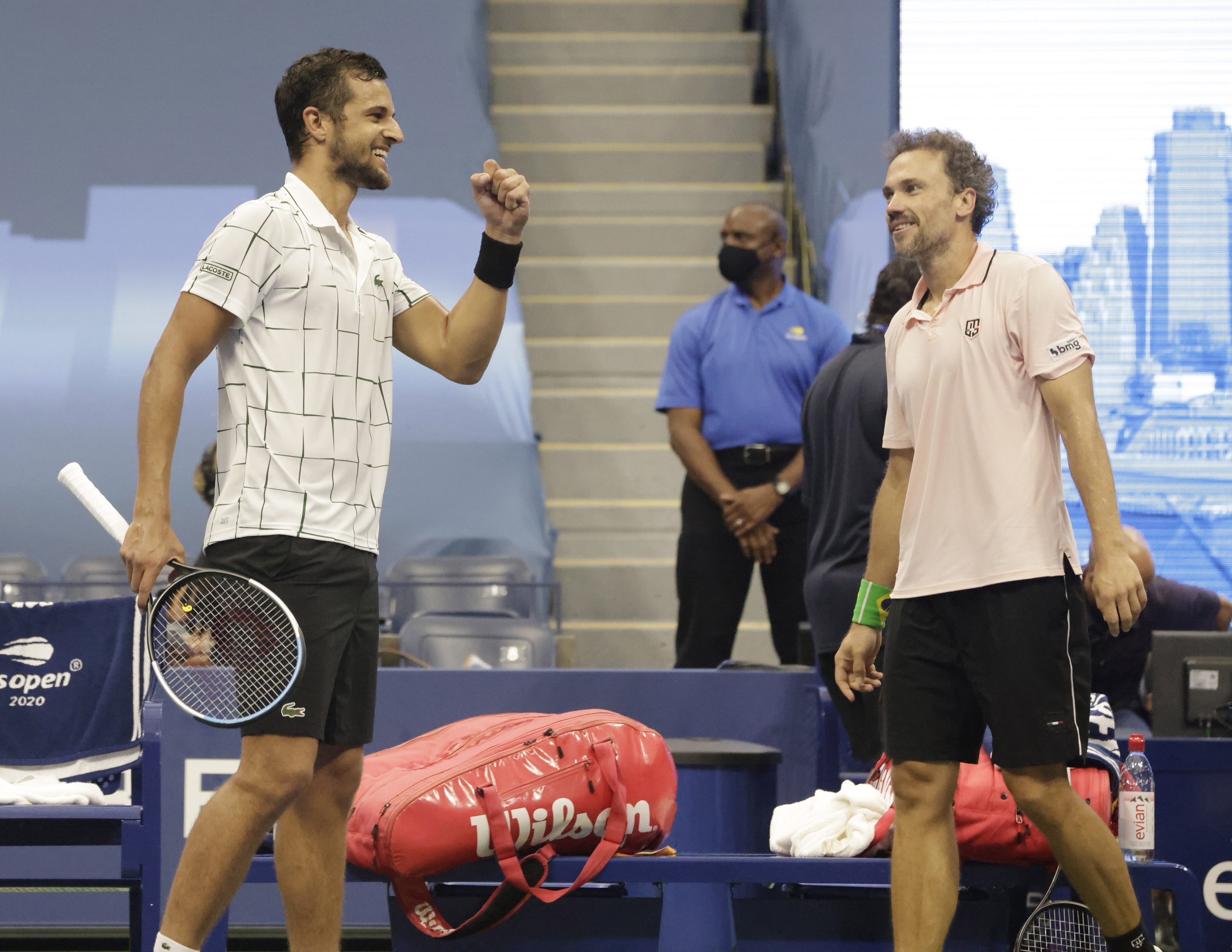 epa08660030 Mate Pavic of Croatia (L) and Bruno Soares of Brazil (R) celebrate after defeating Wesley Koolhof of the Netherlands and Nikola Mektic of Croatia in the men's doubles final match on the eleventh day of the US Open Tennis Championships the USTA National Tennis Center in Flushing Meadows, New York, USA, 10 September 2020. Due to the coronavirus pandemic, the US Open is being played without fans and runs from 31 August through 13 September.  EPA/JASON SZENES