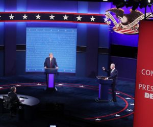 epa08707142 US President Donald J. Trump (L) and Democratic presidential candidate Joe Biden (R) participate in the first 2020 presidential election debate at Samson Pavilion in Cleveland, Ohio, USA, 29 September 2020. The first presidential debate is co-hosted by Case Western Reserve University and the Cleveland Clinic.  EPA/MICHAEL REYNOLDS