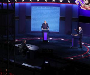 epa08707142 US President Donald J. Trump (L) and Democratic presidential candidate Joe Biden (R) participate in the first 2020 presidential election debate at Samson Pavilion in Cleveland, Ohio, USA, 29 September 2020. The first presidential debate is co-hosted by Case Western Reserve University and the Cleveland Clinic.  EPA/MICHAEL REYNOLDS