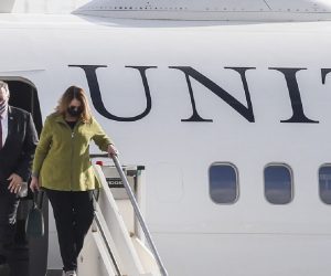 epa08707660 United States Secretary of State Mike Pompeo (L), accopainied by his wife Susan (R), arrives at a military airport in Ciampino, Italy, 30 September 2020.  EPA/FABIO FRUSTACI