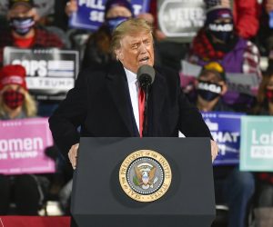 epa08710691 United States President Donald J. Trump speaks during a 'Make America Great Again' election campaign rally at Duluth International Airport in Duluth, Minnesota USA, 30 September 2020. The US presidential elections is slated to be held on 03 November 2020.  EPA/CRAIG LASSIG