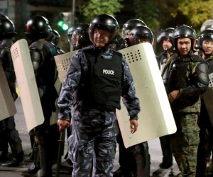 epa08722763 Kyrgyz police prepare to disperse protesters during clashes during opposition protest against the parliamentary election results in central Bishkek, Kyrgyzstan, 05 October 2020. According to reports, thousands of protesters took to the streets protesting against results of parliamentary elections claiming that they were rigged.  EPA/IGOR KOVALENKO