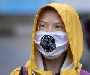 epa08731002 Swedish climate activist Greta Thunberg fronts a Fridays For Future protest at the Swedish Parliament (Riksdagen) in Stockholm, Sweden, 09 October 2020.  EPA/Jessica Gow  SWEDEN OUT