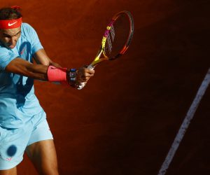 epa08732065 Rafael Nadal of Spain in action against Diego Schwartzman of Argentina during their men’s semi final match during the French Open tennis tournament at Roland ​Garros in Paris, France, 09 October 2020.  EPA/IAN LANGSDON