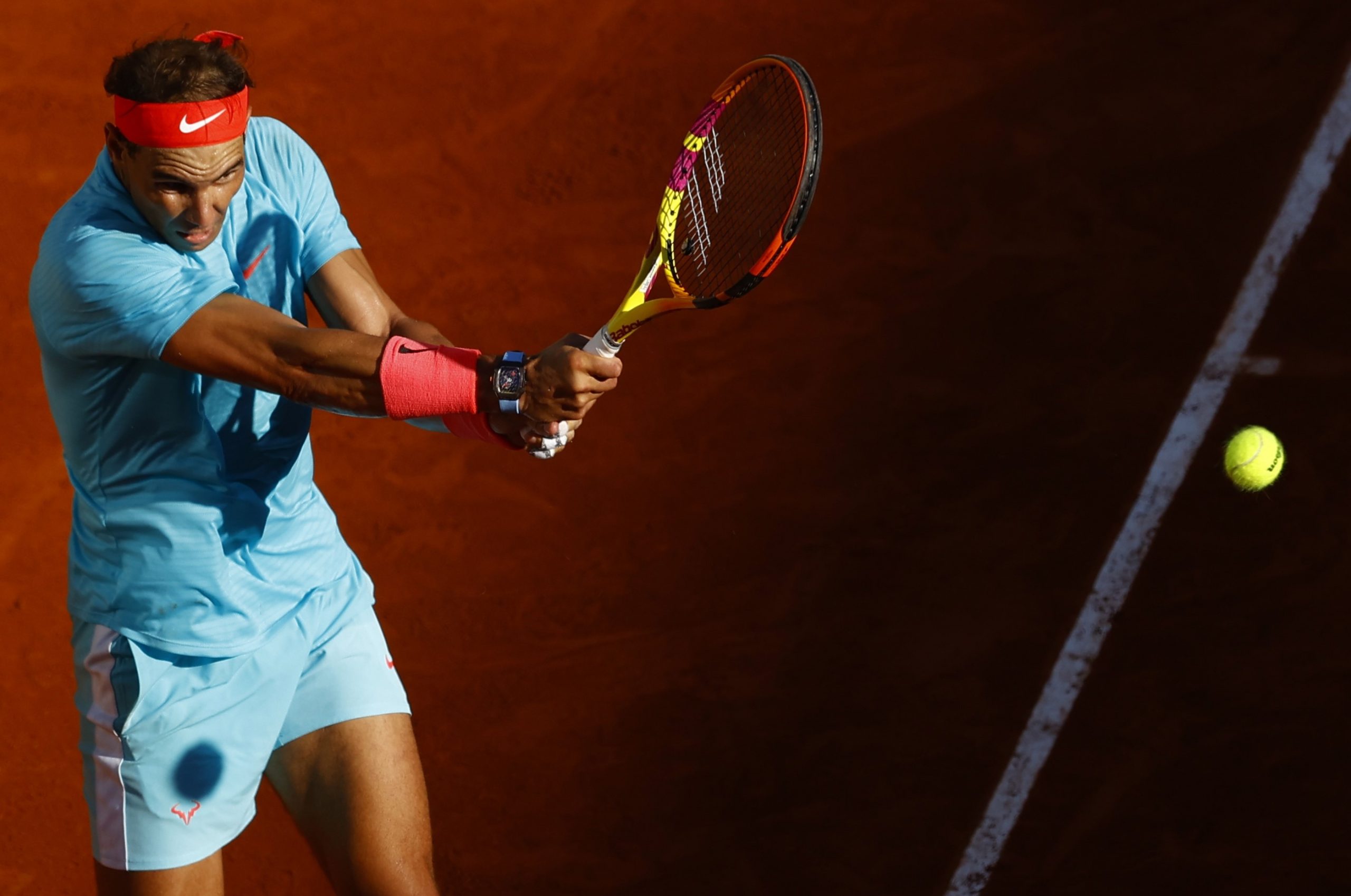 epa08732065 Rafael Nadal of Spain in action against Diego Schwartzman of Argentina during their men’s semi final match during the French Open tennis tournament at Roland ​Garros in Paris, France, 09 October 2020.  EPA/IAN LANGSDON