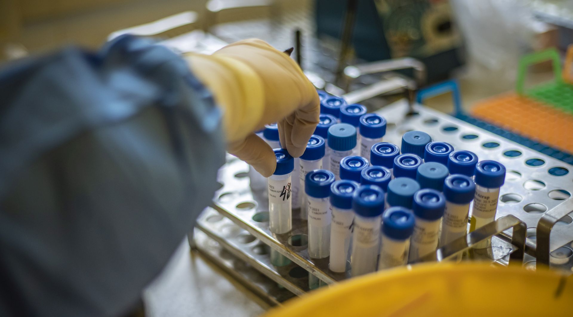 epa08743377 A laboratory technician works on COVID-19 samples at Institute of medical biochemistry and laboratory diagnostics in General University Hospital in Prague, Czech Republic, 14 October 2020. Czech Republic had record rise in the COVID-19 disease, increase in newly detected infections exceeded 8,000 again.  EPA/MARTIN DIVISEK