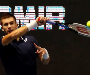 epa08750648 Borna Coric of Croatia in action against Reilly Opelka of the USA during their quarter final match of the St.Petersburg Open ATP tennis tournament in St.Petersburg, Russia, 16 October 2020.  EPA/ANATOLY MALTSEV