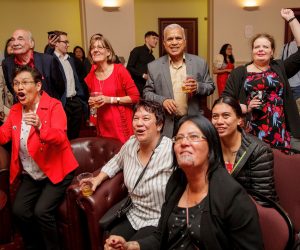 epa08751903 Labour supporters cheer as they watch the results coming in during the New Zealand Labour party election night event in Auckland, New Zealand, 17 October 2020. New Zealanders headed to the polls in the country's 53rd general election.  EPA/DAVID ROWLAND AUSTRALIA AND NEW ZEALAND OUT