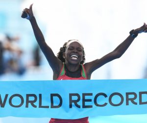 epa08752337 Peres Jepchirchir from Kenya celebrates winning the International Association of Athletics Federations (IAAF) women's World Half Marathon Championships 2020 in Gdynia, northern Poland, 17 October 2020.  Peres Jepchirchir has set women-only world record.  EPA/ADAM WARZAWA POLAND OUT