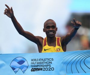 epa08752590 Jacob Kiplimo of Uganda wins the men's race of the International Association of Athletics Federations (IAAF) World Half Marathon Championships 2020 in Gdynia, northern Poland, 17 October 2020.  EPA/ADAM WARZAWA POLAND OUT