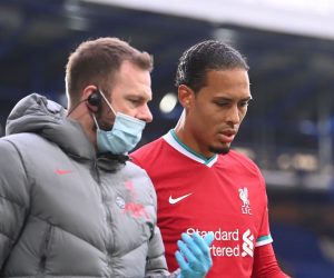 epa08752418 Virgil van Dijk of Liverpool reacts as he leaves the pitch during the English Premier League match between Everton and Liverpool in Liverpool, Britain, 17 October 2020.  EPA/Laurence Griffiths / POOL EDITORIAL USE ONLY. No use with unauthorized audio, video, data, fixture lists, club/league logos or 'live' services. Online in-match use limited to 120 images, no video emulation. No use in betting, games or single club/league/player publications.