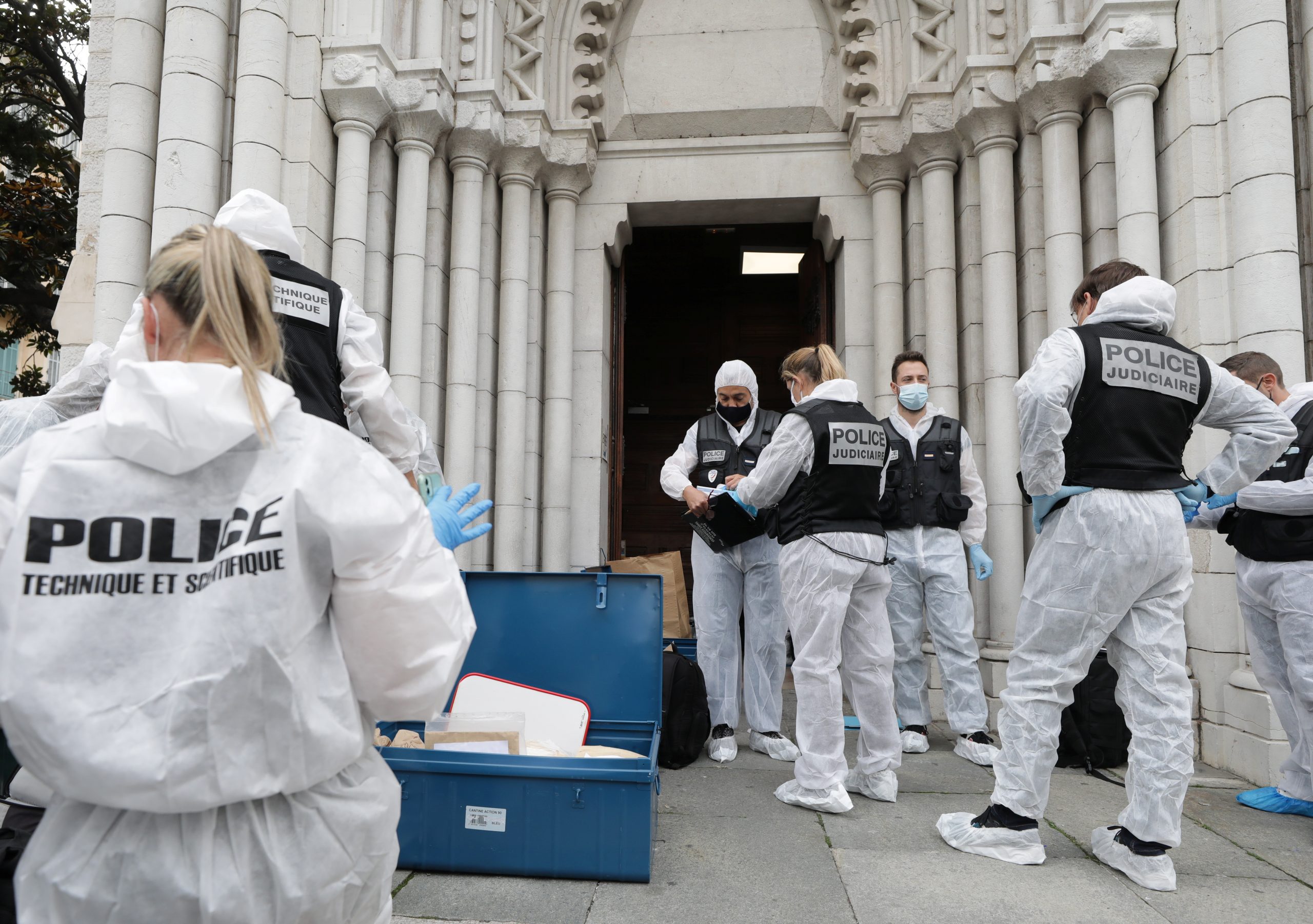 epa08782914 Forensic specialists inspect the scene of a reported knife attack at Notre Dame church in Nice, France, 29 October 2020. According to recent reports, at least three people are reported to have died in what officials treat as a terror attack. The attack comes less than a month after the beheading of a French middle school teacher in Paris on 16 October.  EPA/ERIC GAILLARD / POOL  MAXPPP OUT
