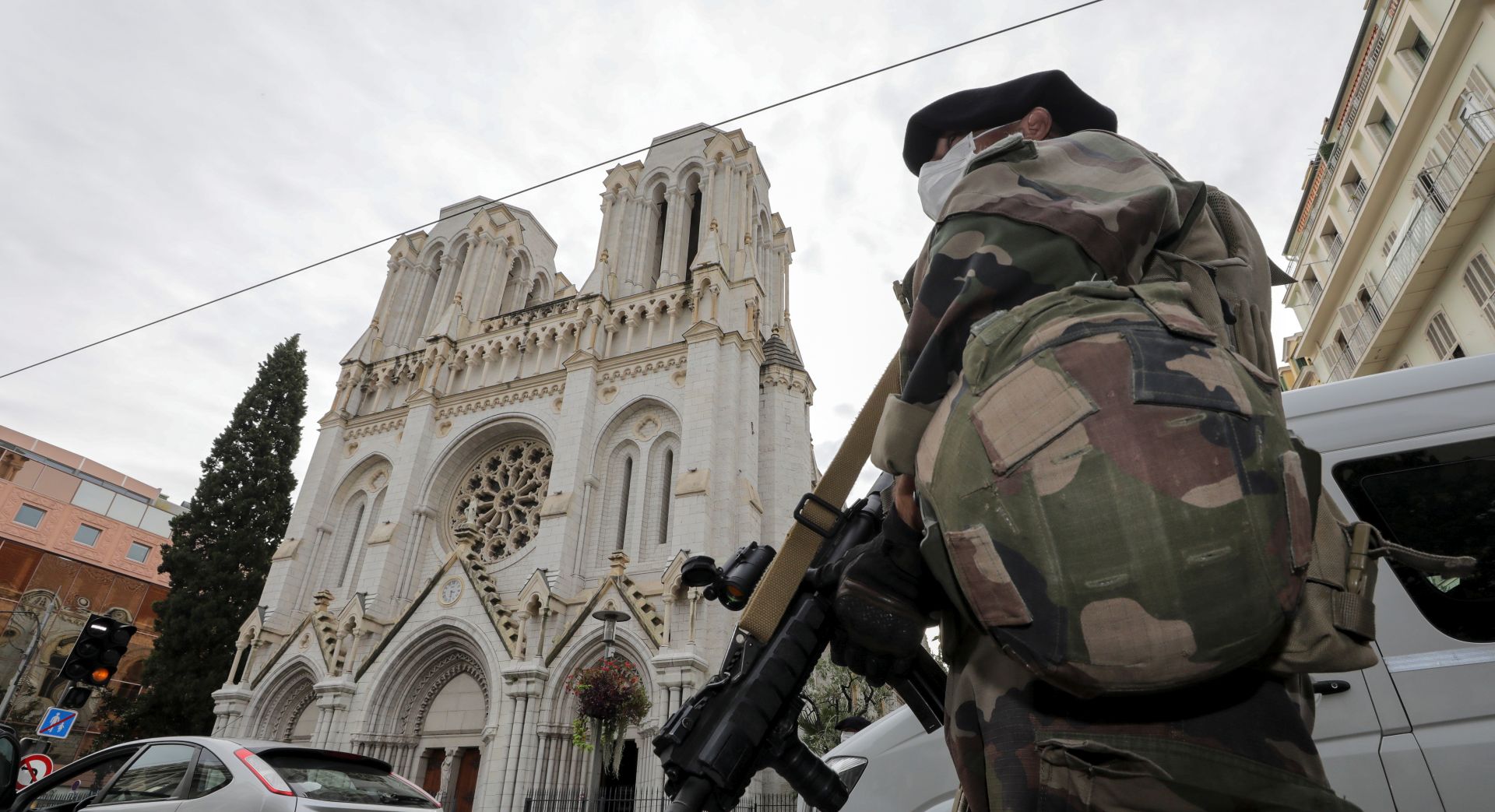 epa08783456 A French soldier stands in front of Notre-Dame church, where a knife attack took place, in Nice, France, 29 October 2020. According to recent reports, at least three people are reported to have died in what officials treat as a terror attack. The attack comes less than a month after the beheading of a French middle school teacher in Paris on 16 October.  EPA/ERIC GAILLARD / POOL  MAXPPP OUT